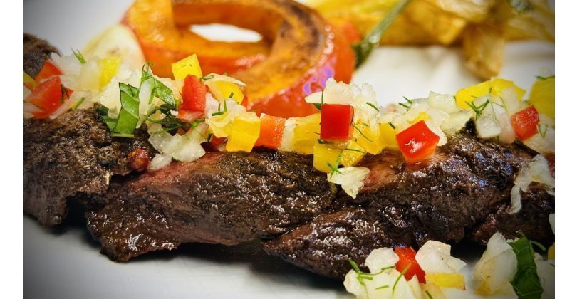 Kangaroo entrecote with pumpkin and potatoes and pepper-onion vinaigrette