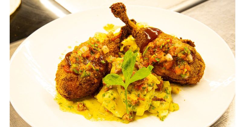 Breaded Chicken Drumsticks on Warm Potato Salad with Chorizo