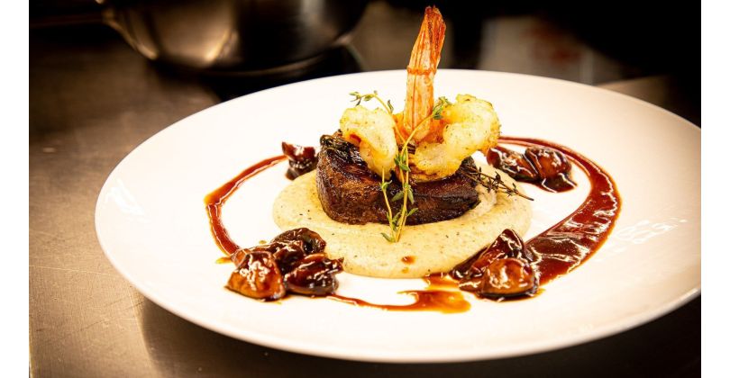 Surf and Turf with Beef Fillet and Prawns on Truffle Mashed Potatoes, Balsamic Mushrooms & Red Wine Reduction with Cognac